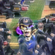 An abstract Waluigi being attacked by men in suits.